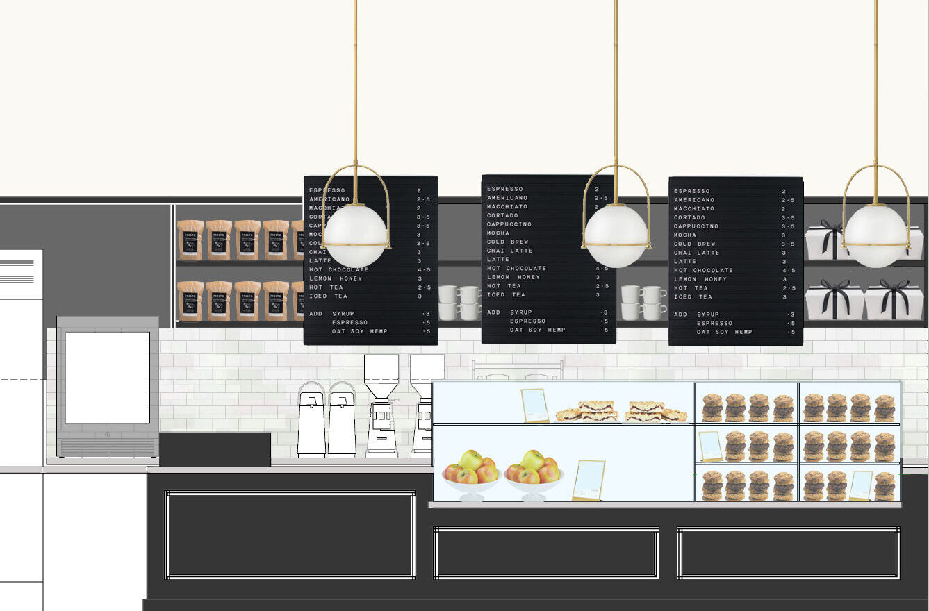 Contemporary cafe counter with menu boards and display case.