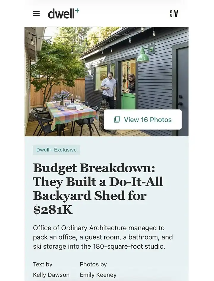 Small backyard studio with outdoor dining area and blue siding in Seattle.